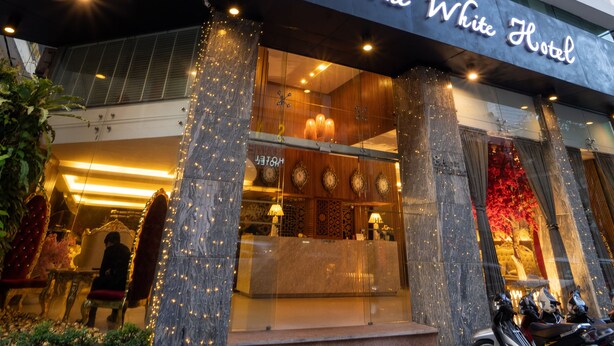 The White Hotel with a modern facade, large windows, and a prominent entrance with steps and a covered area. - The White Hotel 8A Thai Van Lung (Ho Chi Minh City)