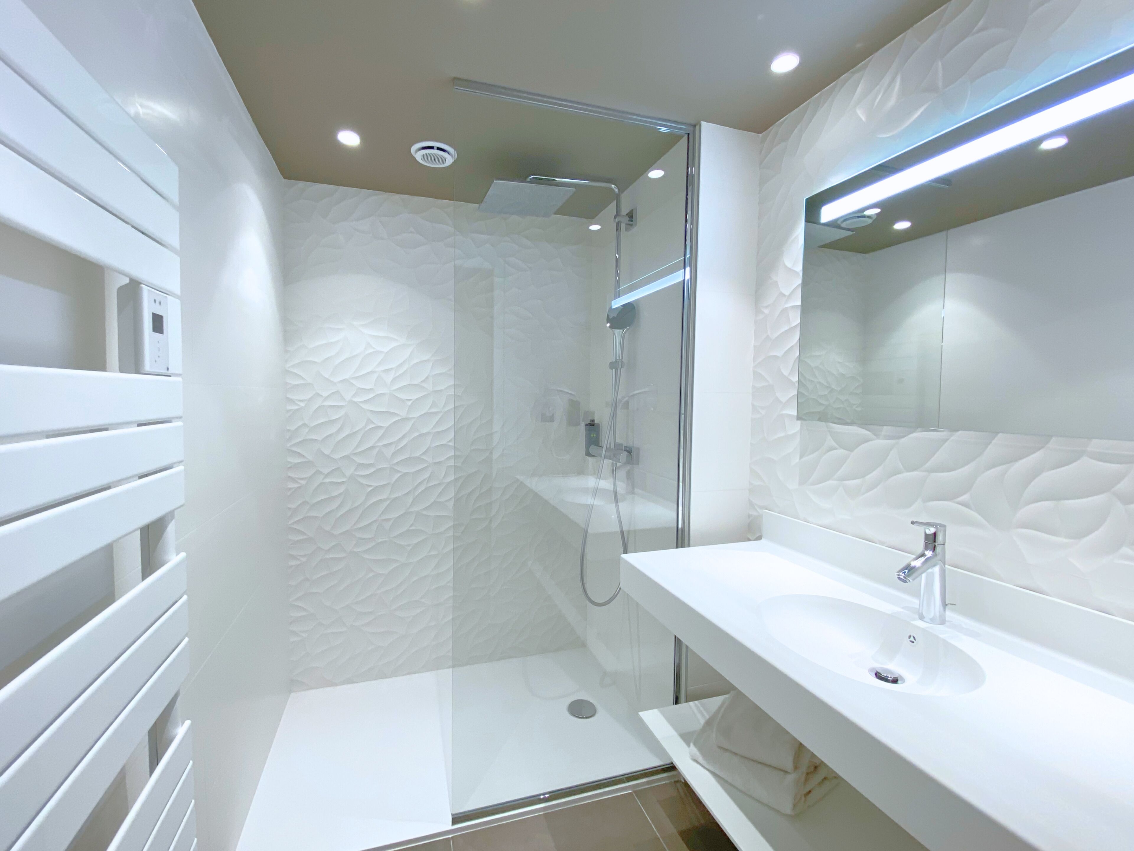 superior room | bathroom | shower, hair dryer, towels