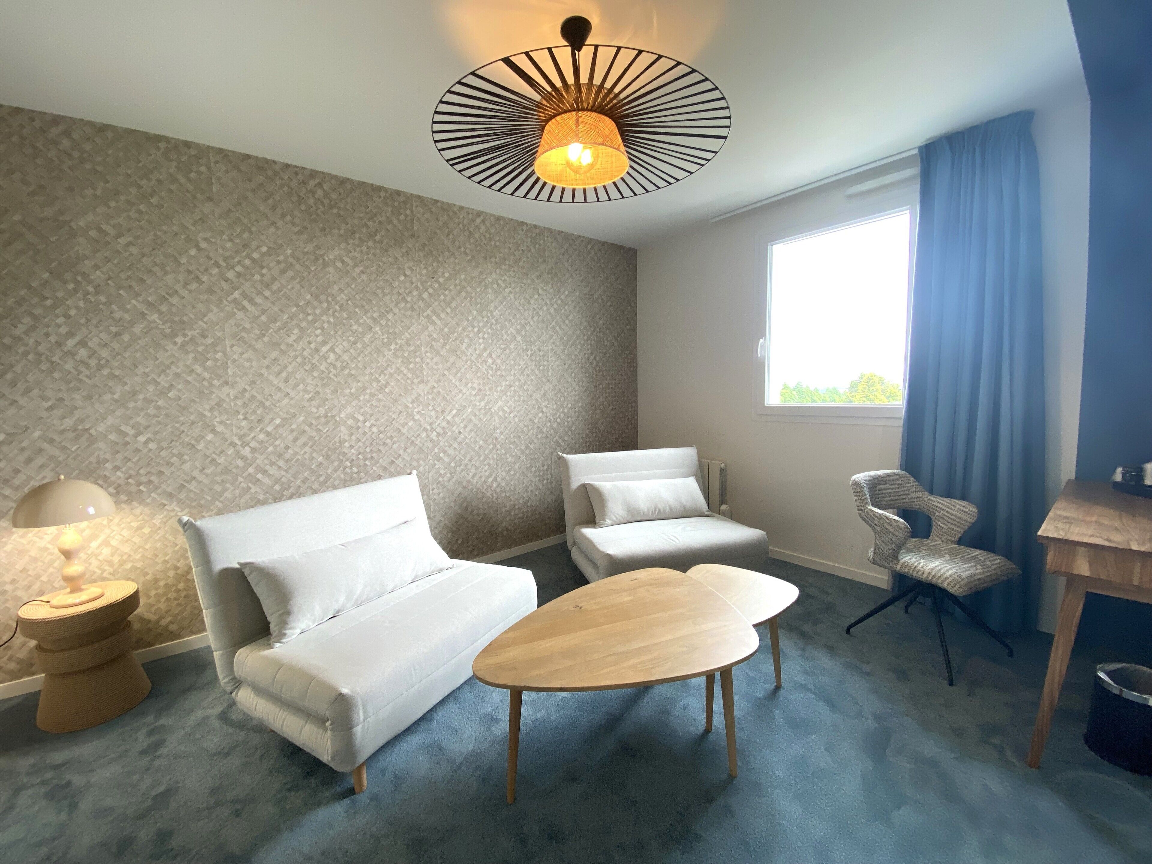 family room | premium bedding, desk, blackout curtains, soundproofing