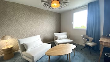 Family Room | Premium bedding, desk, blackout drapes, soundproofing