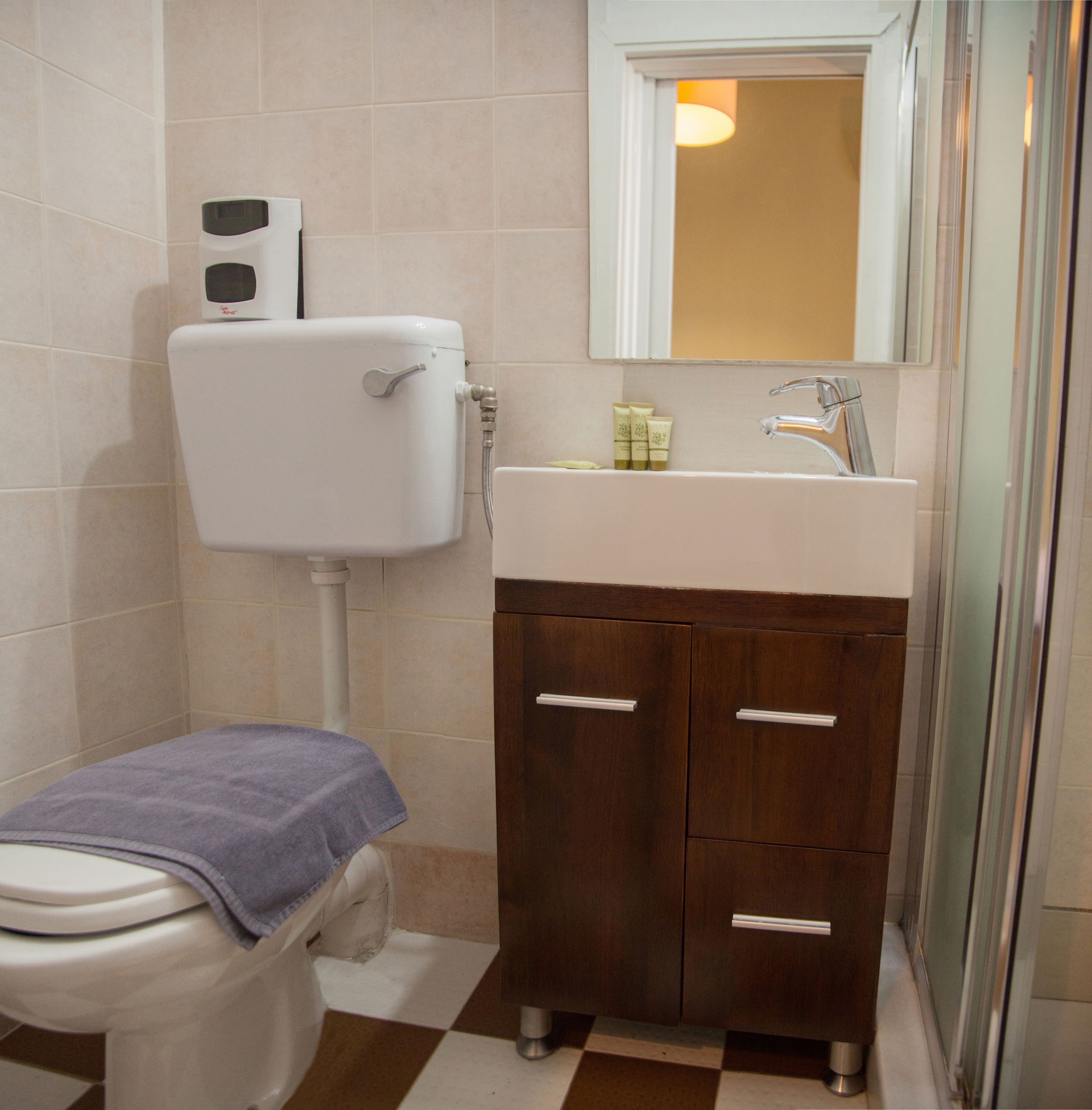 comfort room | bathroom | shower, hair dryer, towels