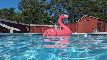 Seasonal outdoor pool, open 8:00 AM to 9:00 PM, pool umbrellas