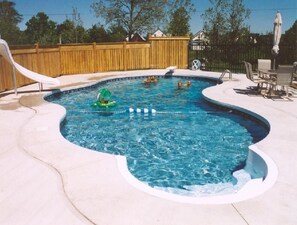 Seasonal outdoor pool, open 8:00 AM to 9:00 PM, pool umbrellas