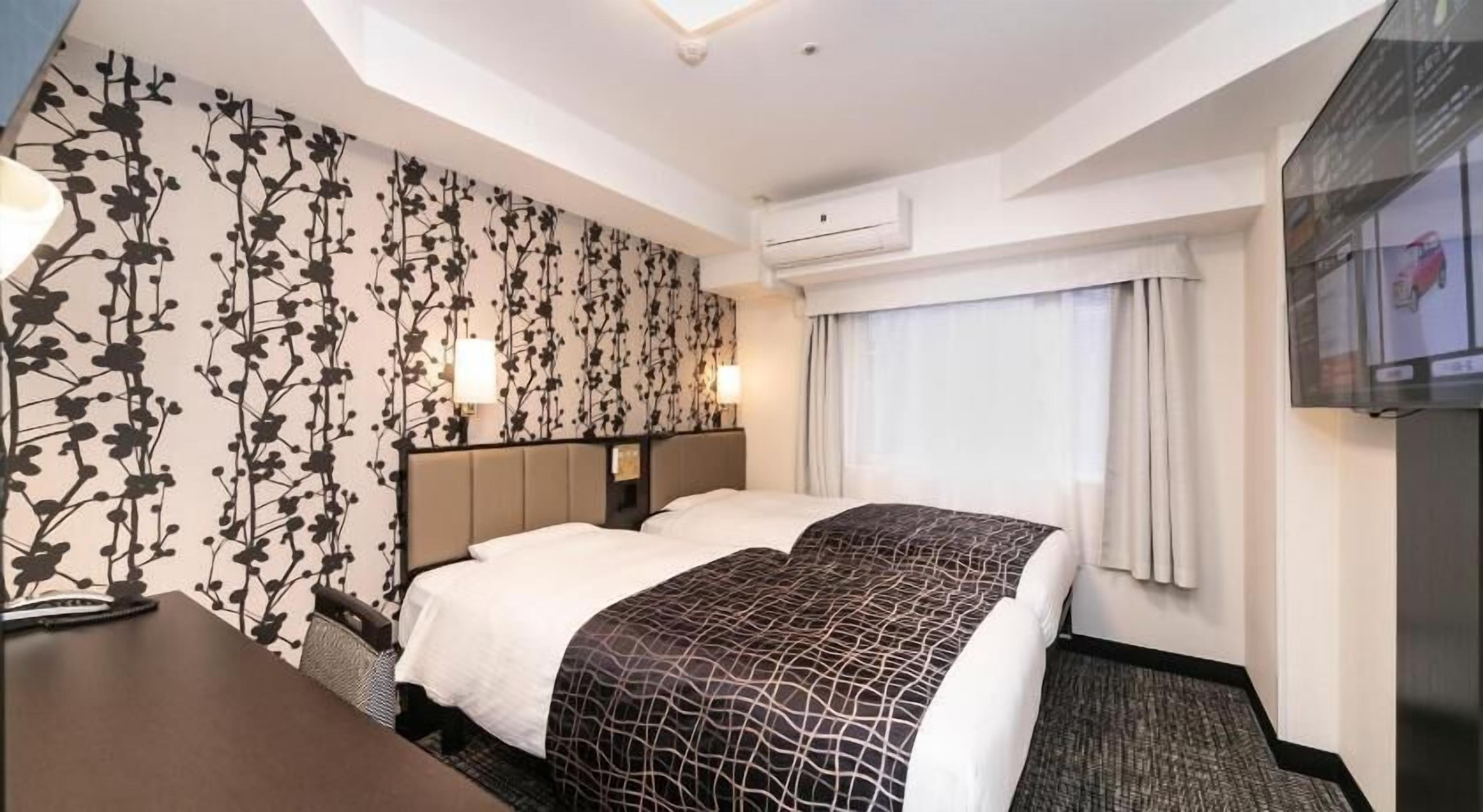 Premium bedding, down duvets, desk, laptop workspace