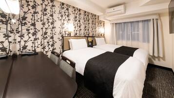 Premium bedding, down duvets, desk, laptop workspace