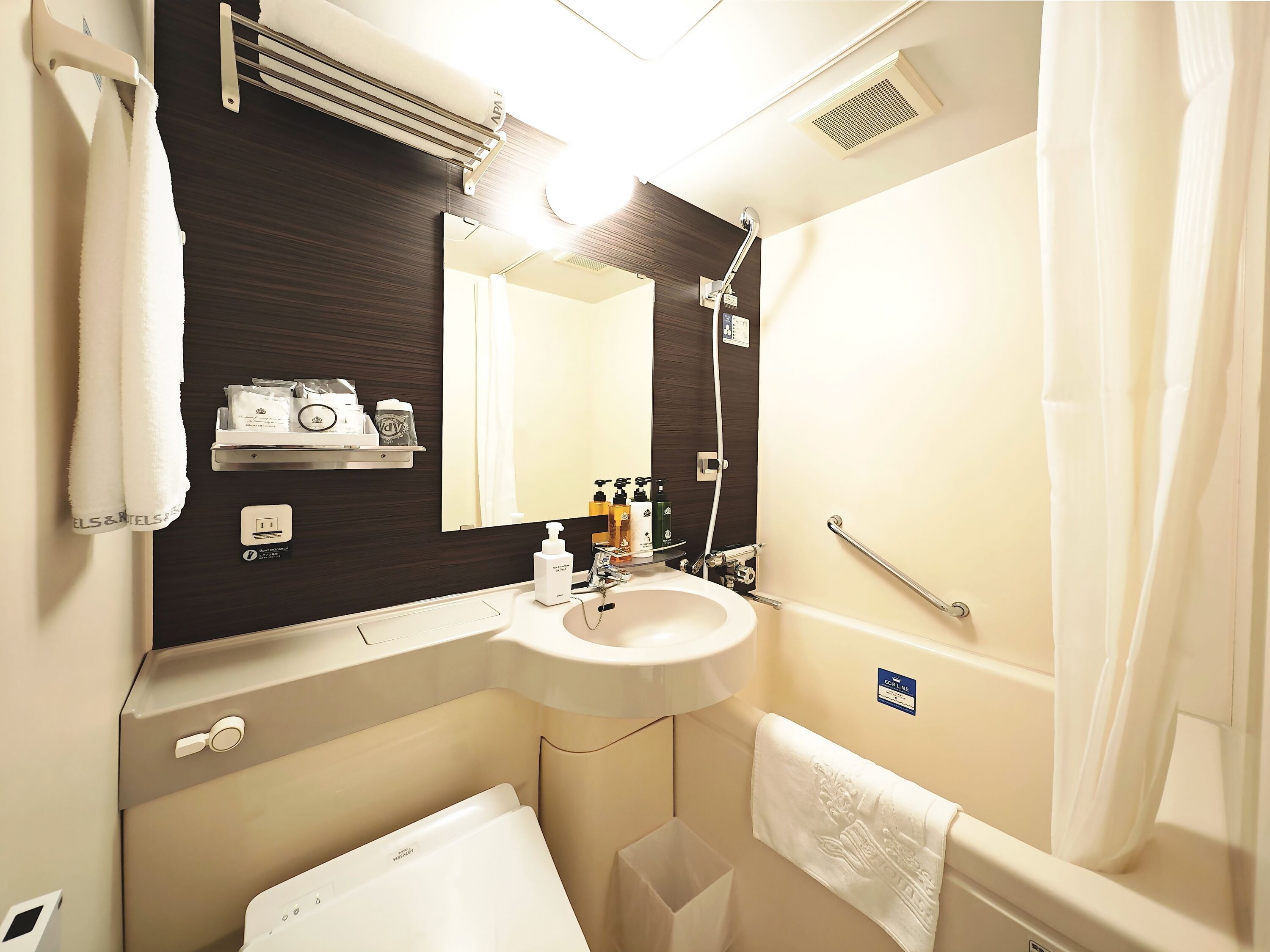 Combined shower/tub, free toiletries, hair dryer, slippers