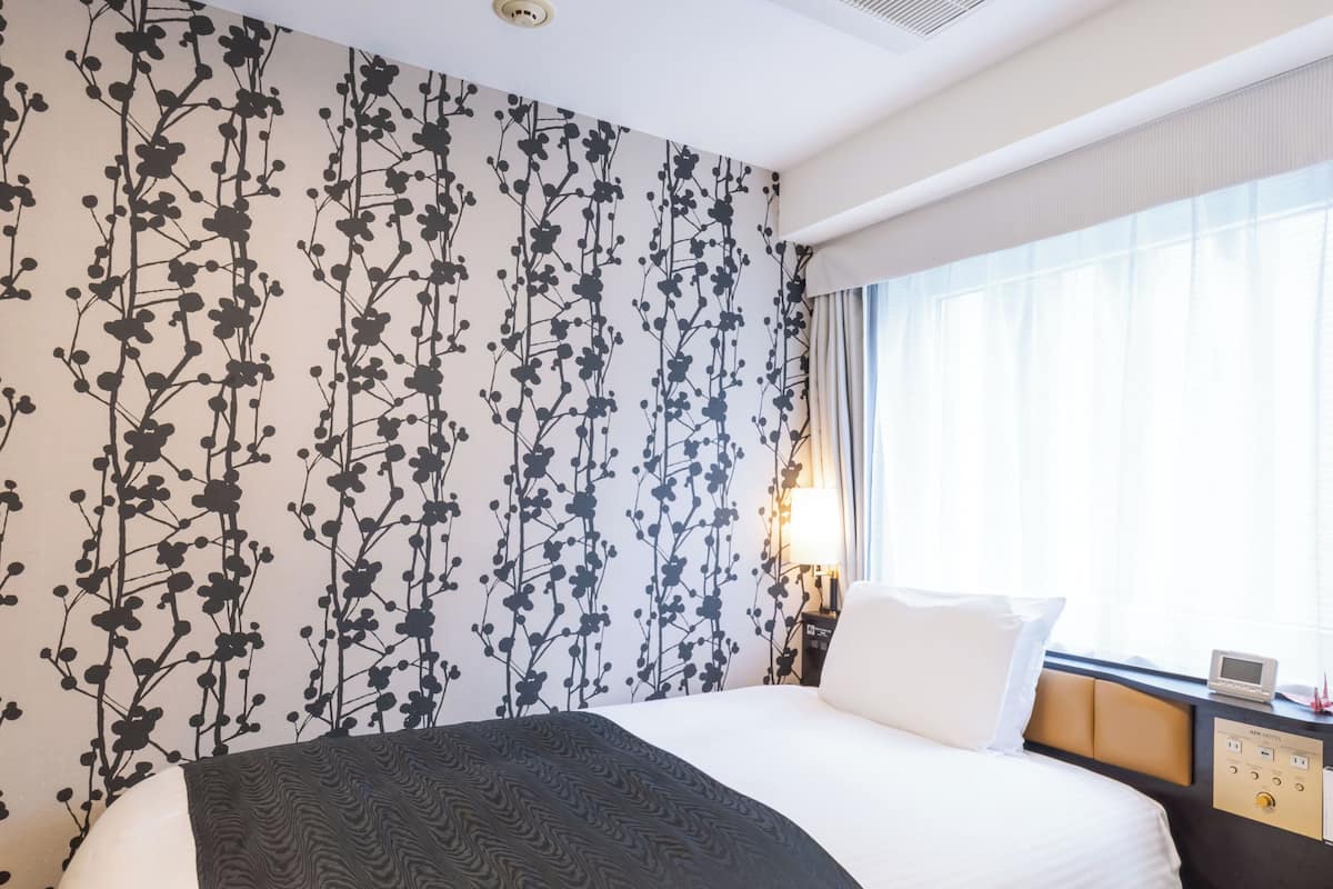 Premium bedding, down comforters, desk, blackout drapes