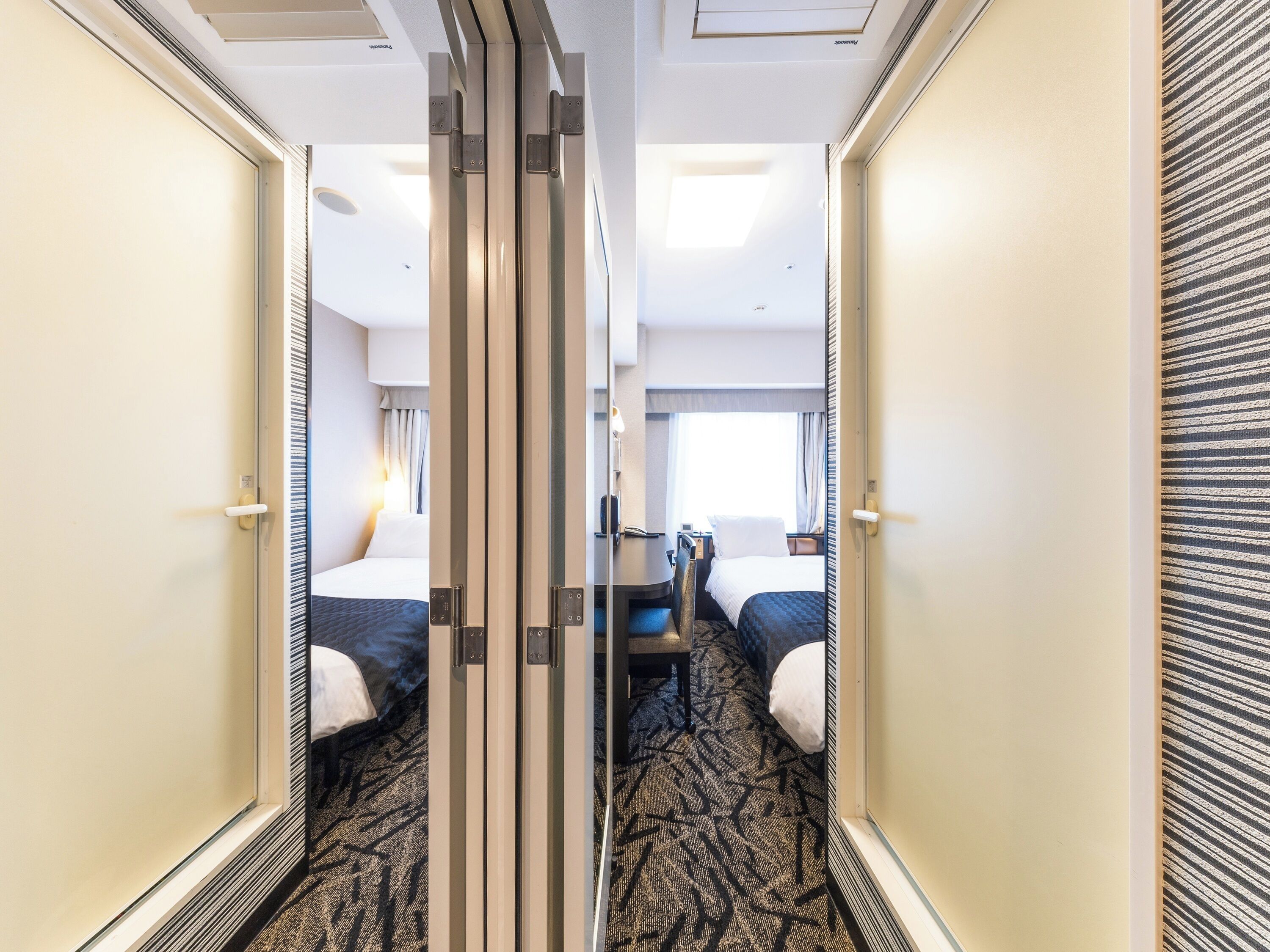 premium bedding, down duvets, desk, blackout curtains