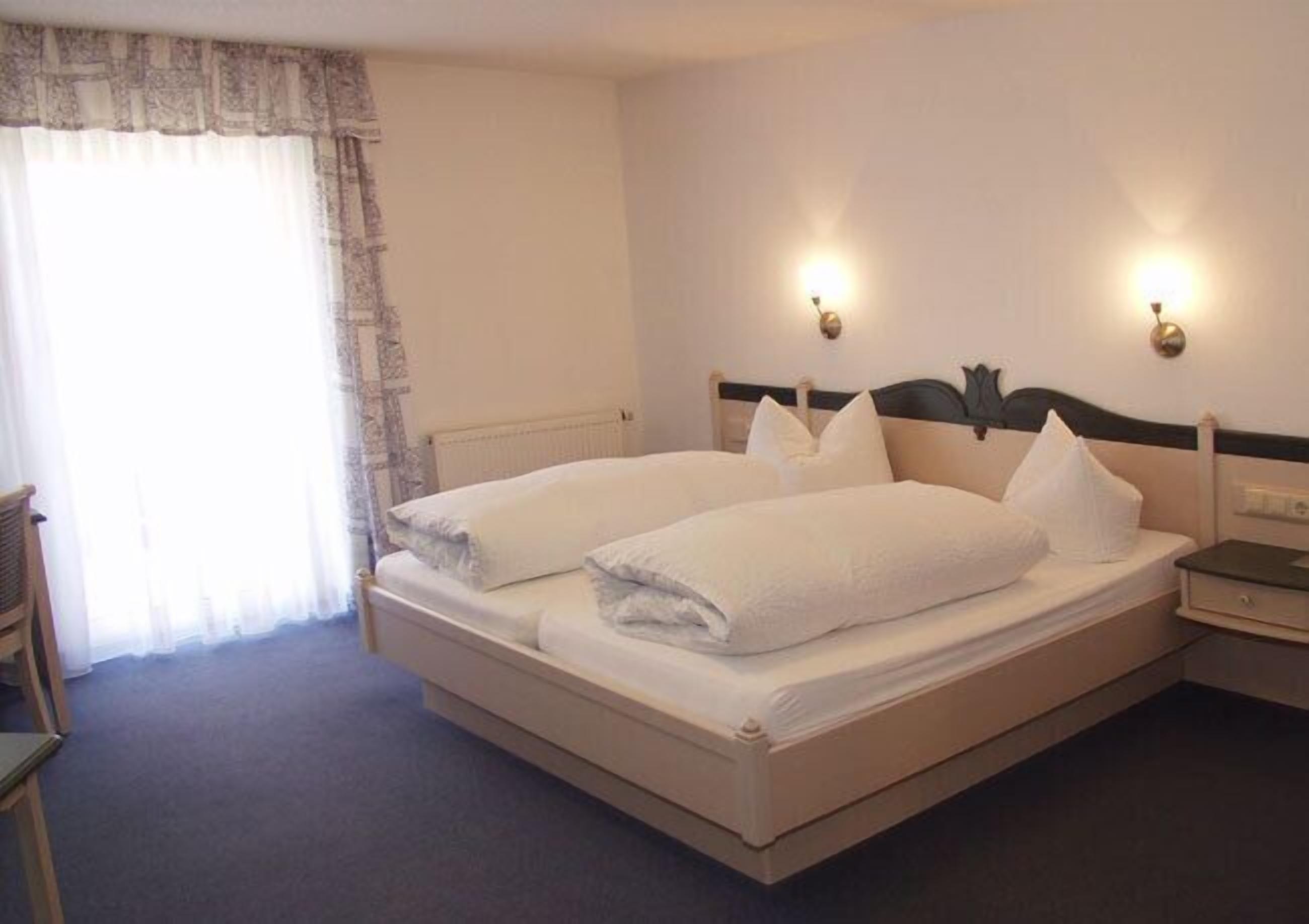 double room | premium bedding, down duvets, individually decorated, blackout curtains