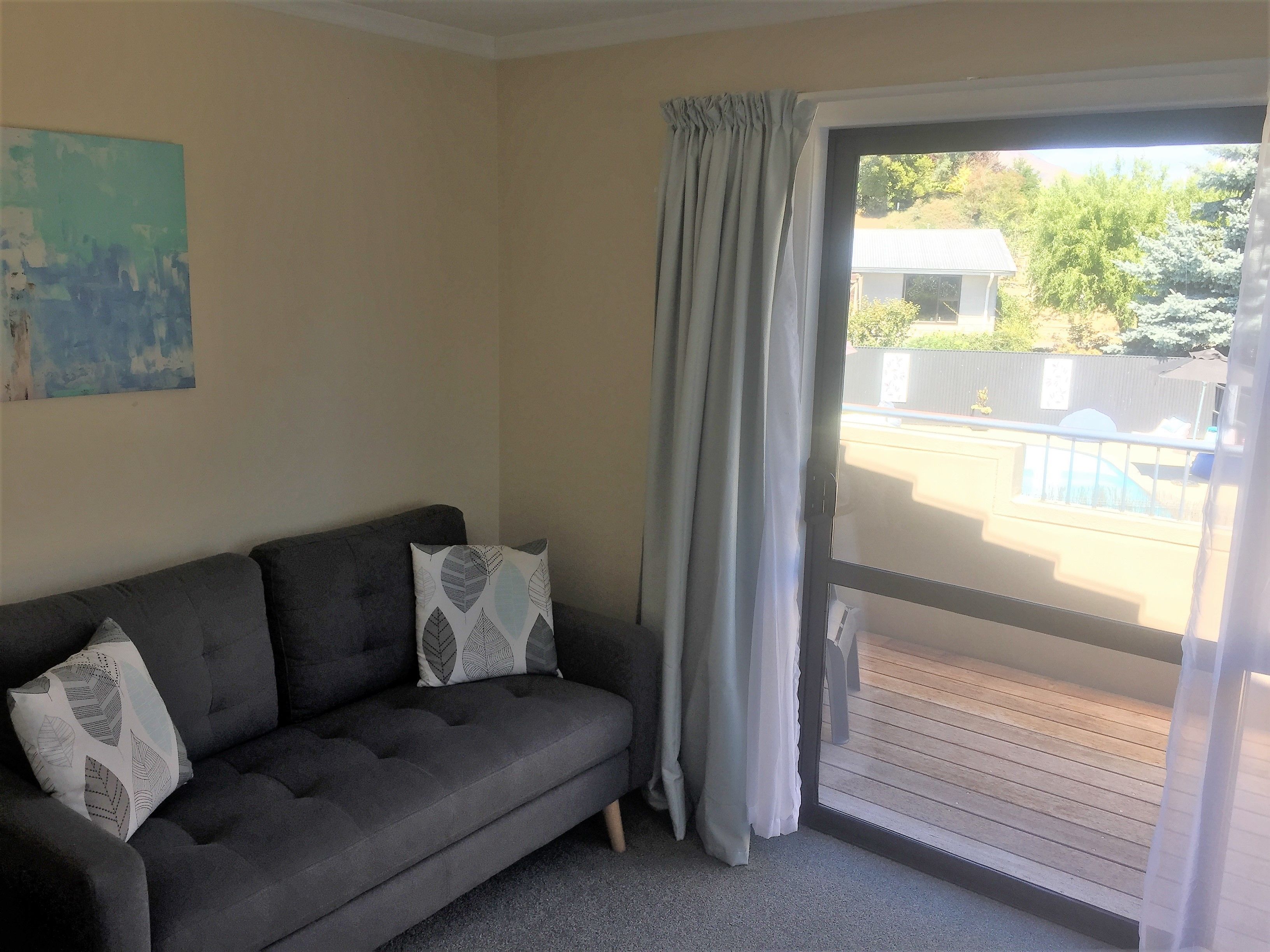 Romantic Studio Suite, 1 King Bed, Jetted Tub | Living area | LCD TV