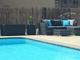 Seasonal outdoor pool, pool umbrellas, sun loungers