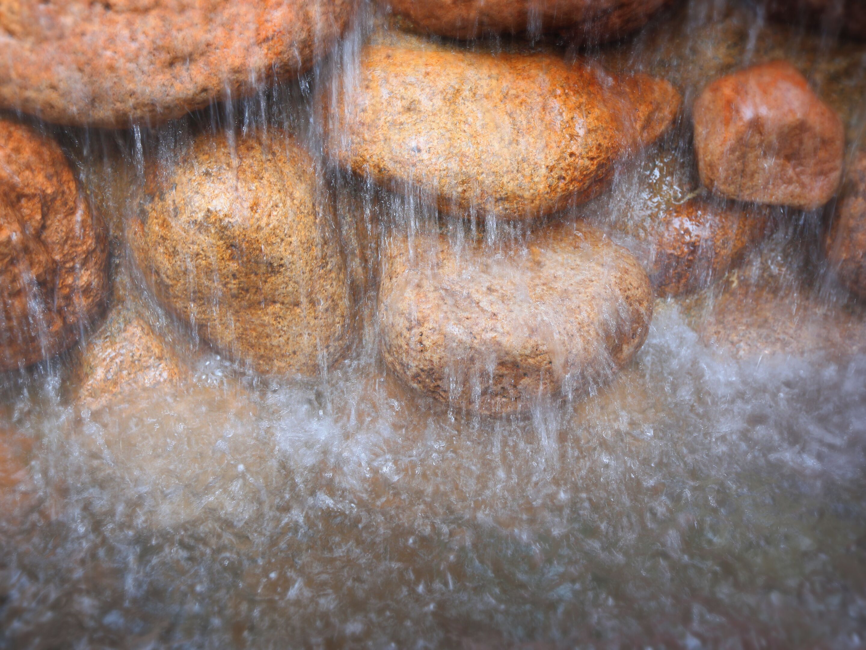 A close-up of a waterfall cascading over rocks.