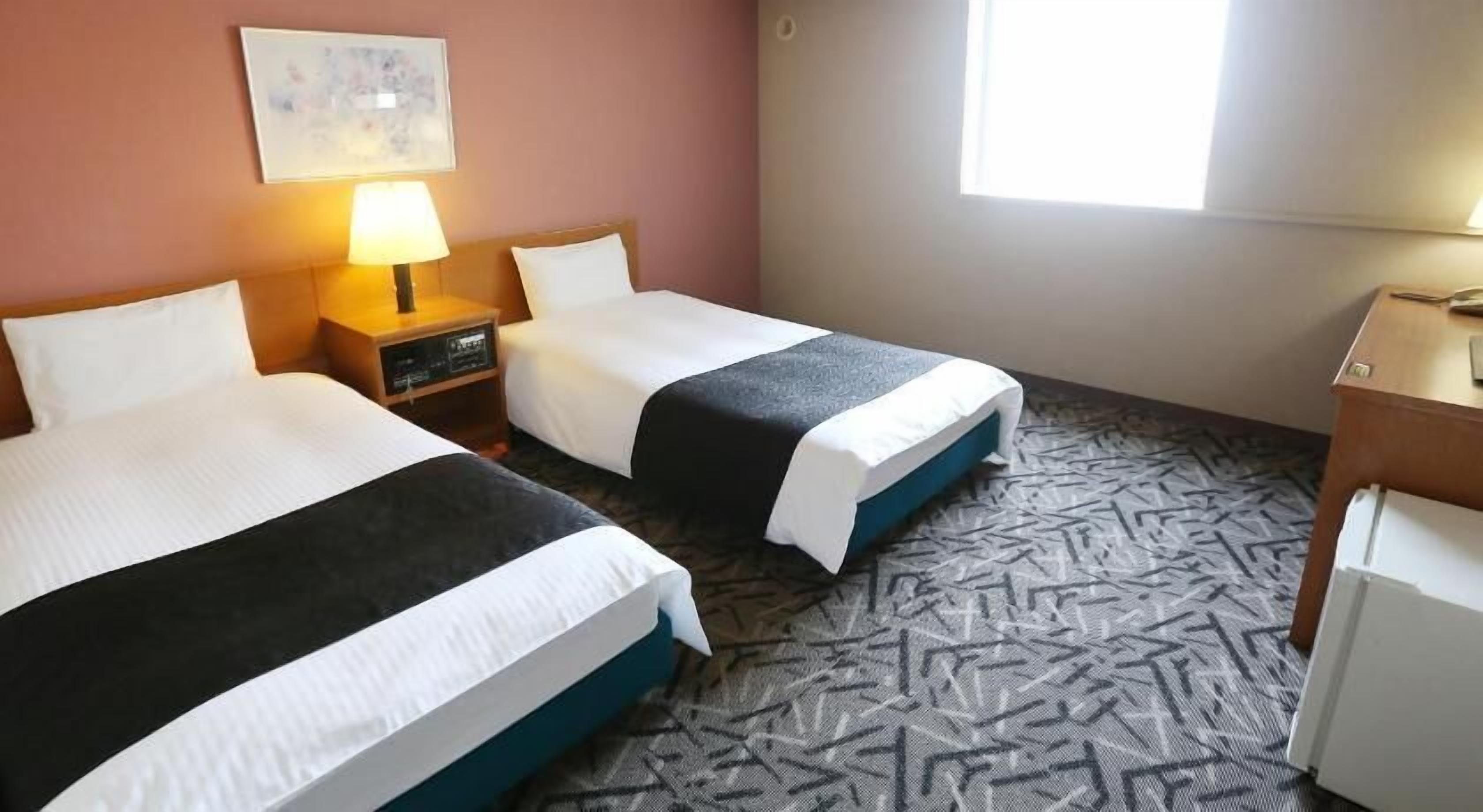 Down comforters, desk, free WiFi, bed sheets