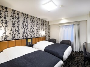 Combined shower/bathtub, hair dryer, slippers, towels