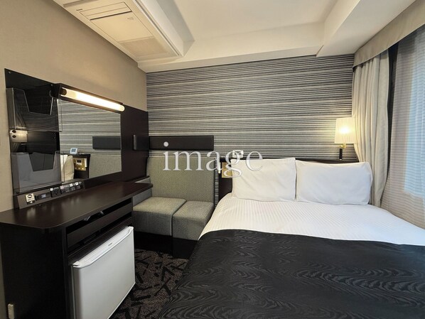 Down comforters, desk, blackout drapes, free WiFi