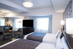 Habitación Deluxe con 2 camas individuales, para no fumadores | Edredón, escritorio, cortinas blackout y insonorización 