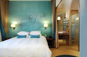 Premium bedding, memory-foam beds, in-room safe, desk