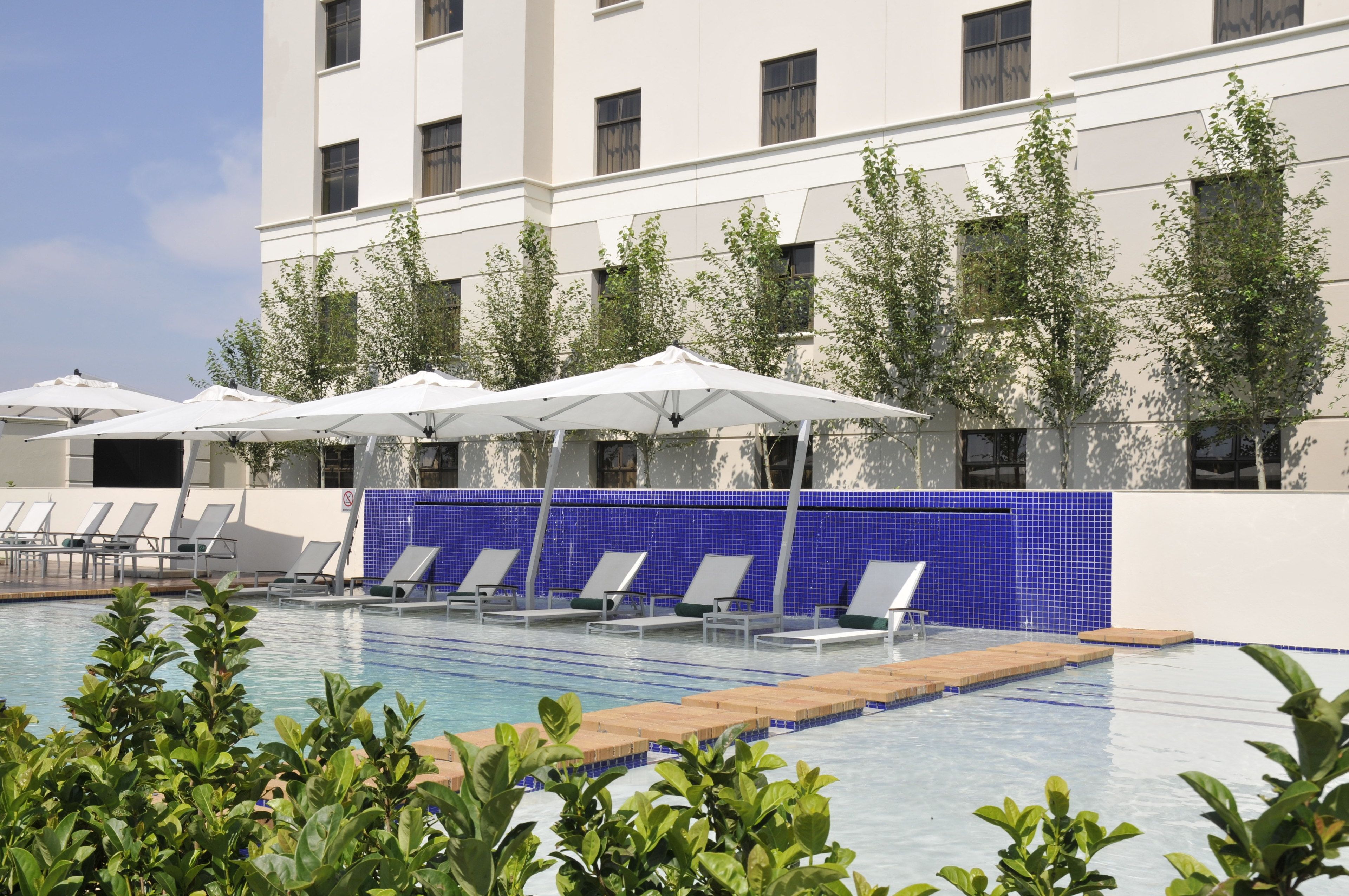 outdoor pool, open 5 pm to 6 pm, pool umbrellas, pool loungers