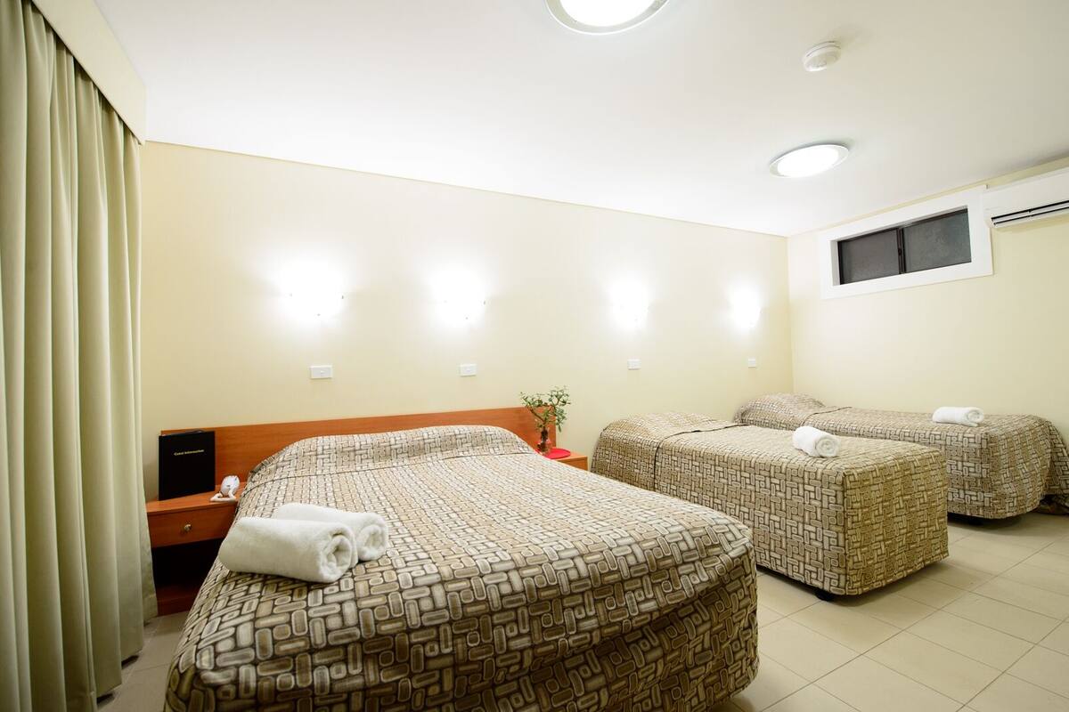 Deluxe Family Room | Premium bedding, iron/ironing board, cots/infant beds, free WiFi