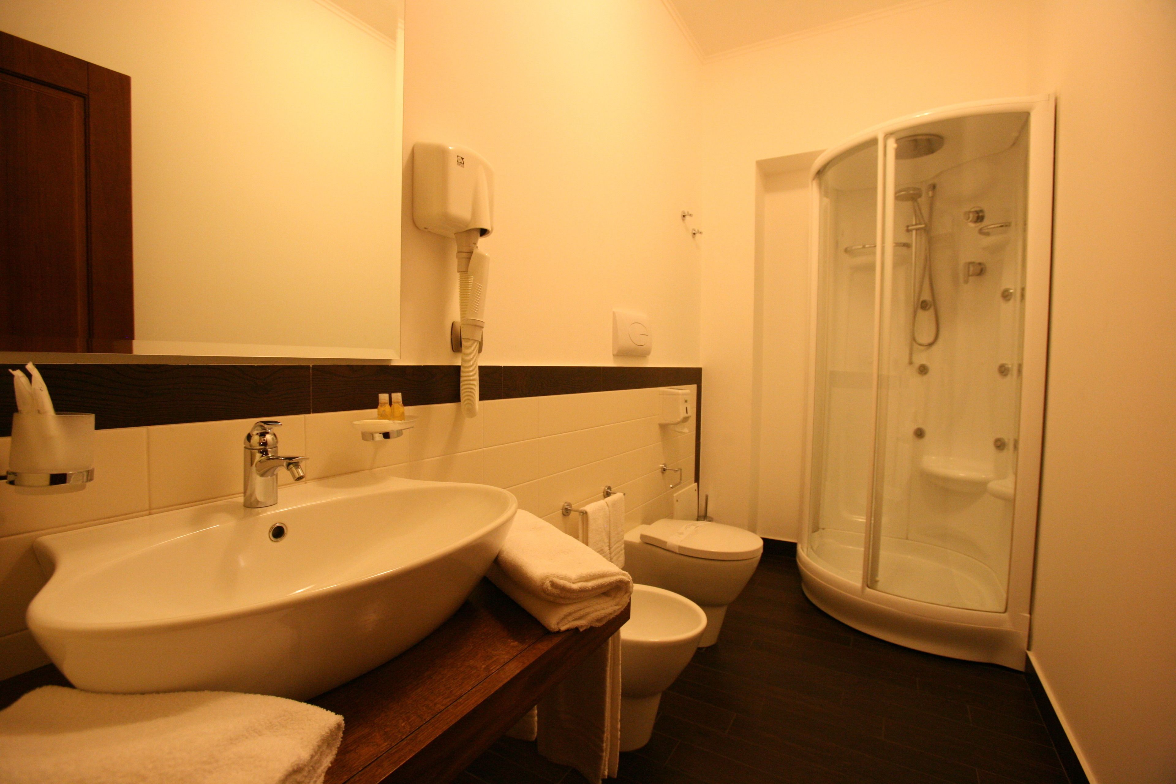 double room single use | bathroom | shower, hydromassage showerhead, free toiletries, hair dryer