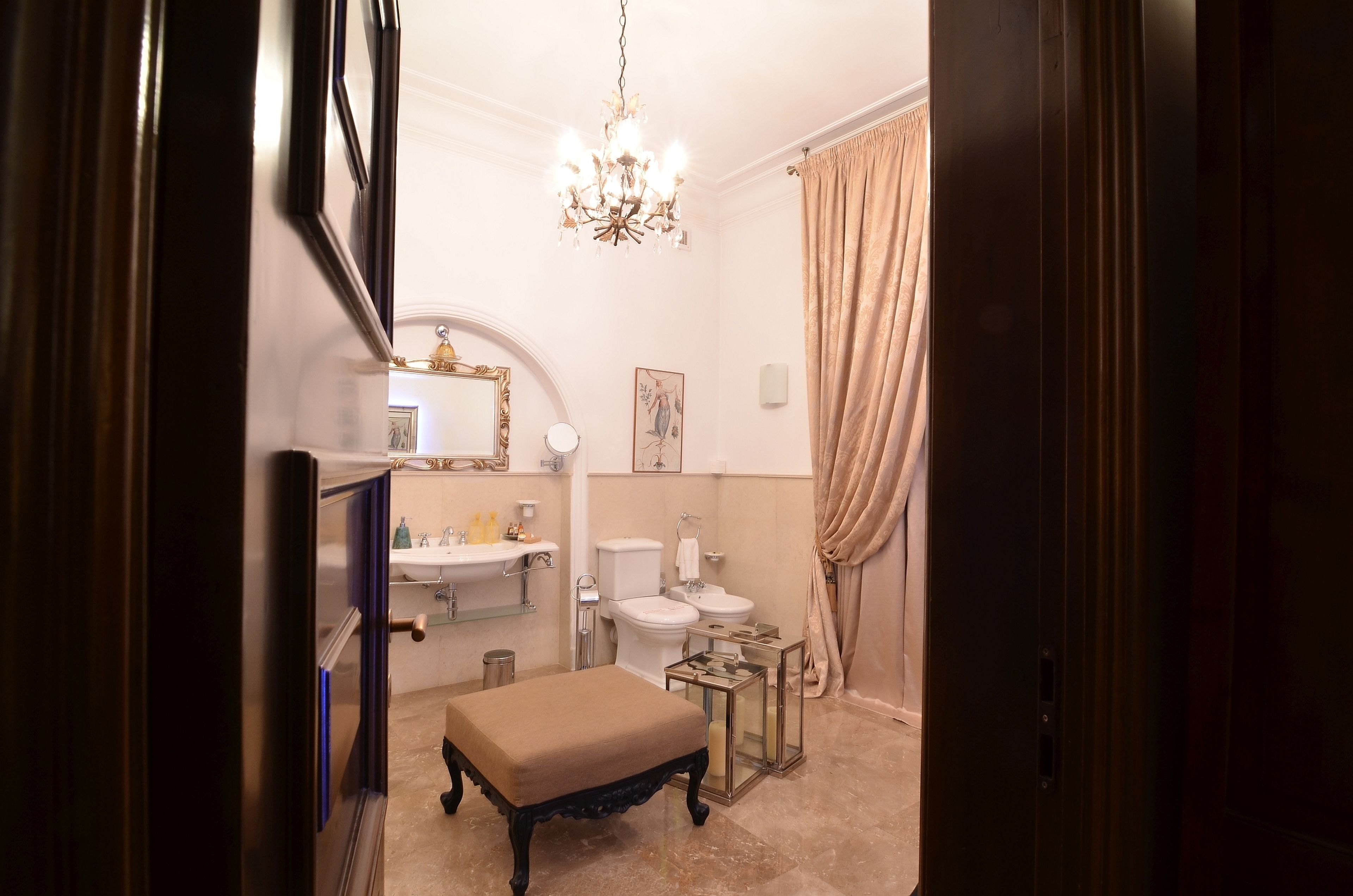premium double room, 1 queen bed | bathroom | designer toiletries, hair dryer, bathrobes, slippers