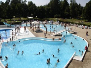 Outdoor pool, pool umbrellas, sun loungers