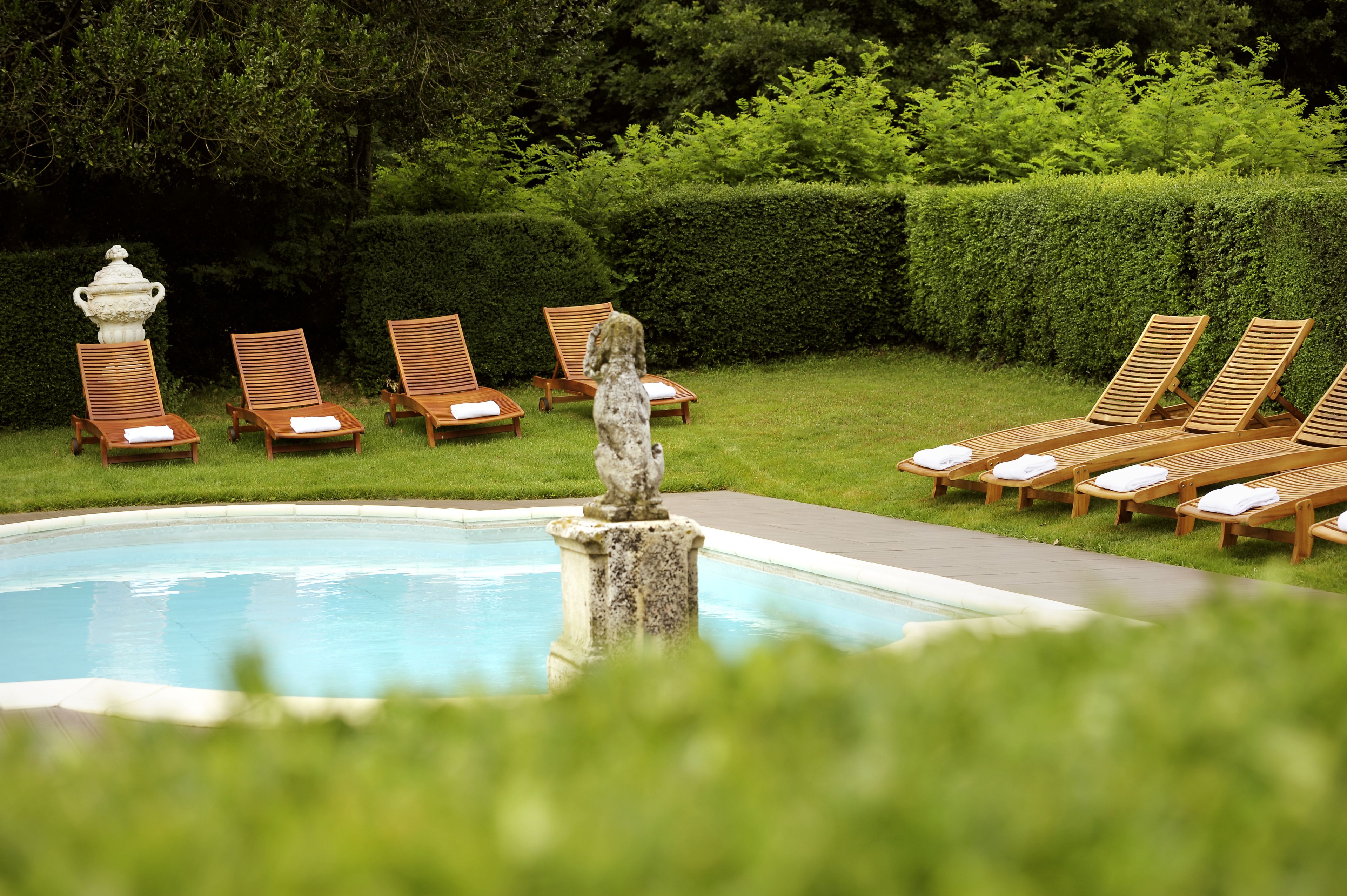 outdoor pool, pool umbrellas, pool loungers