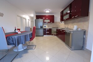 Standard Apartment, 2 Bedrooms, Terrace, Garden View | Living area | Flat-screen TV