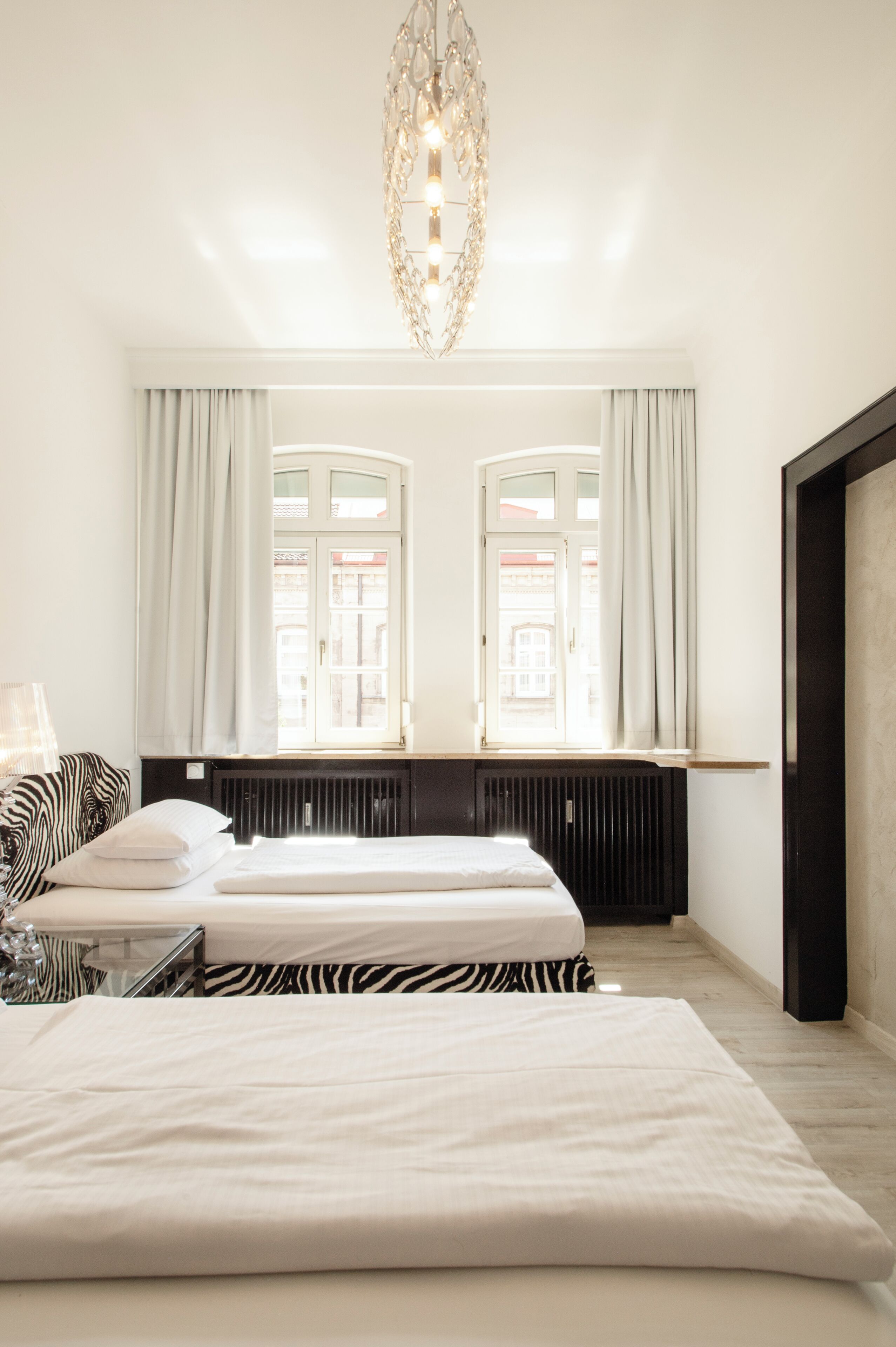 deluxe suite, 2 bedrooms, non smoking, bathtub | 1 bedroom, premium bedding, minibar, individually decorated