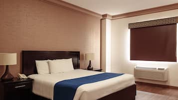 Habitación estándar | Ropa de cama de alta calidad y edredón