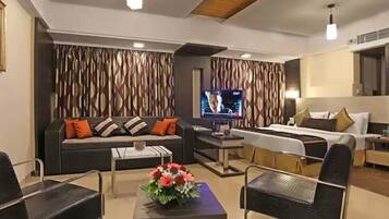 27-inch flat-screen TV with cable channels, TV