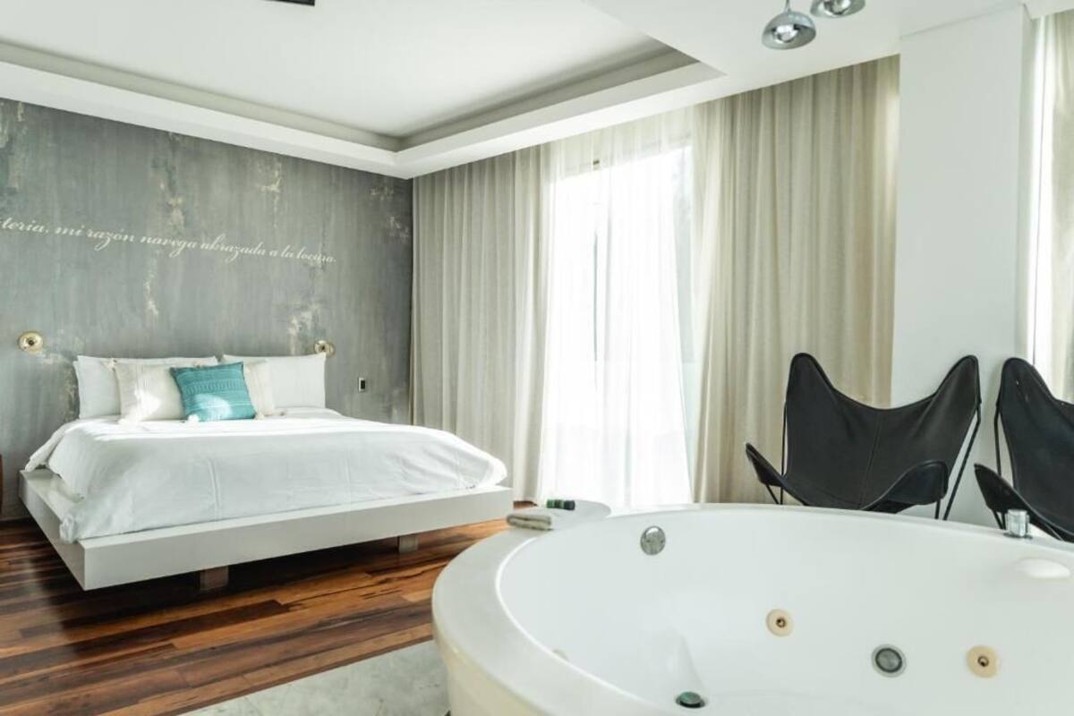 Junior Suite | 1 bedroom, hypo-allergenic bedding available, in-room safe, desk