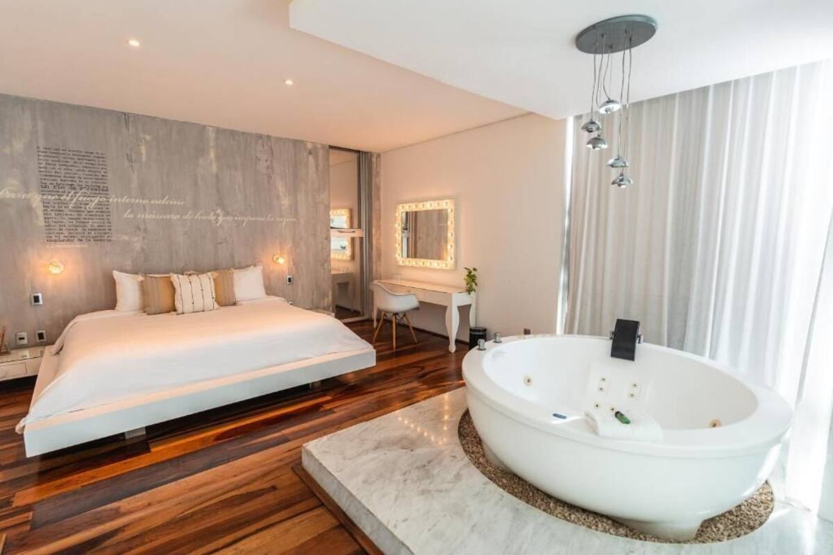 Master Suite | 1 bedroom, hypo-allergenic bedding available, in-room safe, desk