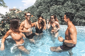 Outdoor pool, pool umbrellas, sun loungers