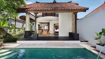 Luxe beddengoed, een minibar, een kluis op de kamer