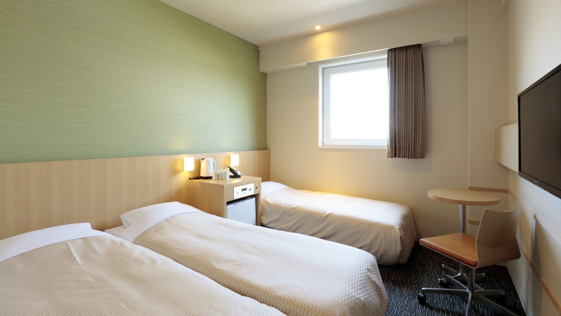 Luxe beddengoed, een bureau, geluiddichte muren, gratis wifi