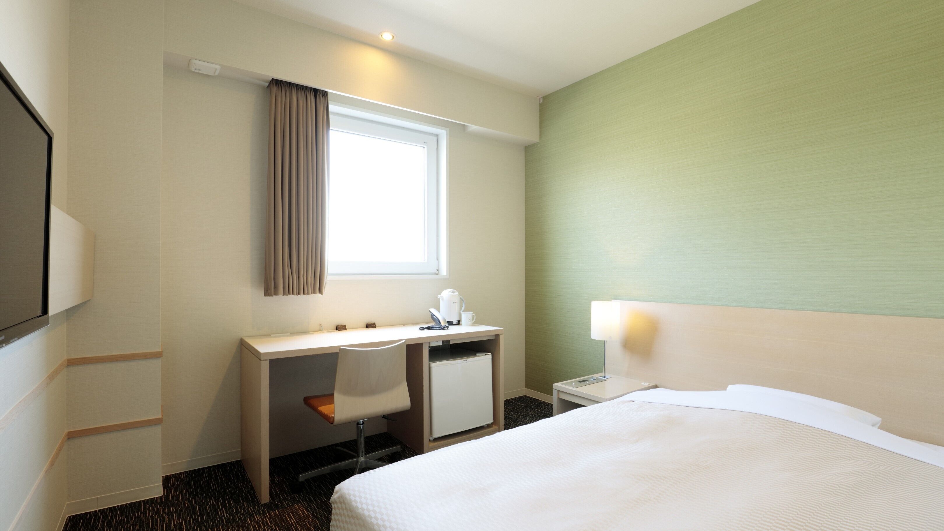 Luxe beddengoed, een bureau, geluiddichte muren, gratis wifi