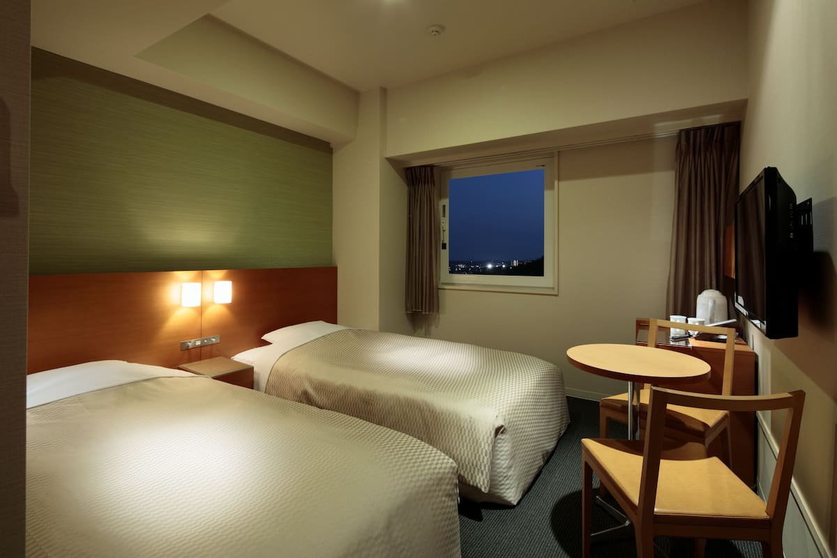 Premium bedding, blackout drapes, soundproofing, iron/ironing board