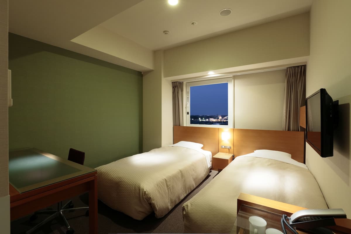 Premium bedding, blackout drapes, soundproofing, iron/ironing board