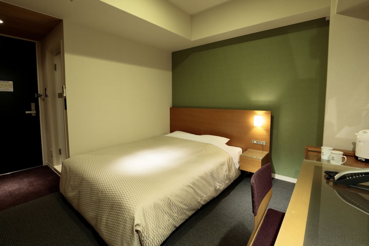 Premium bedding, blackout drapes, soundproofing, iron/ironing board