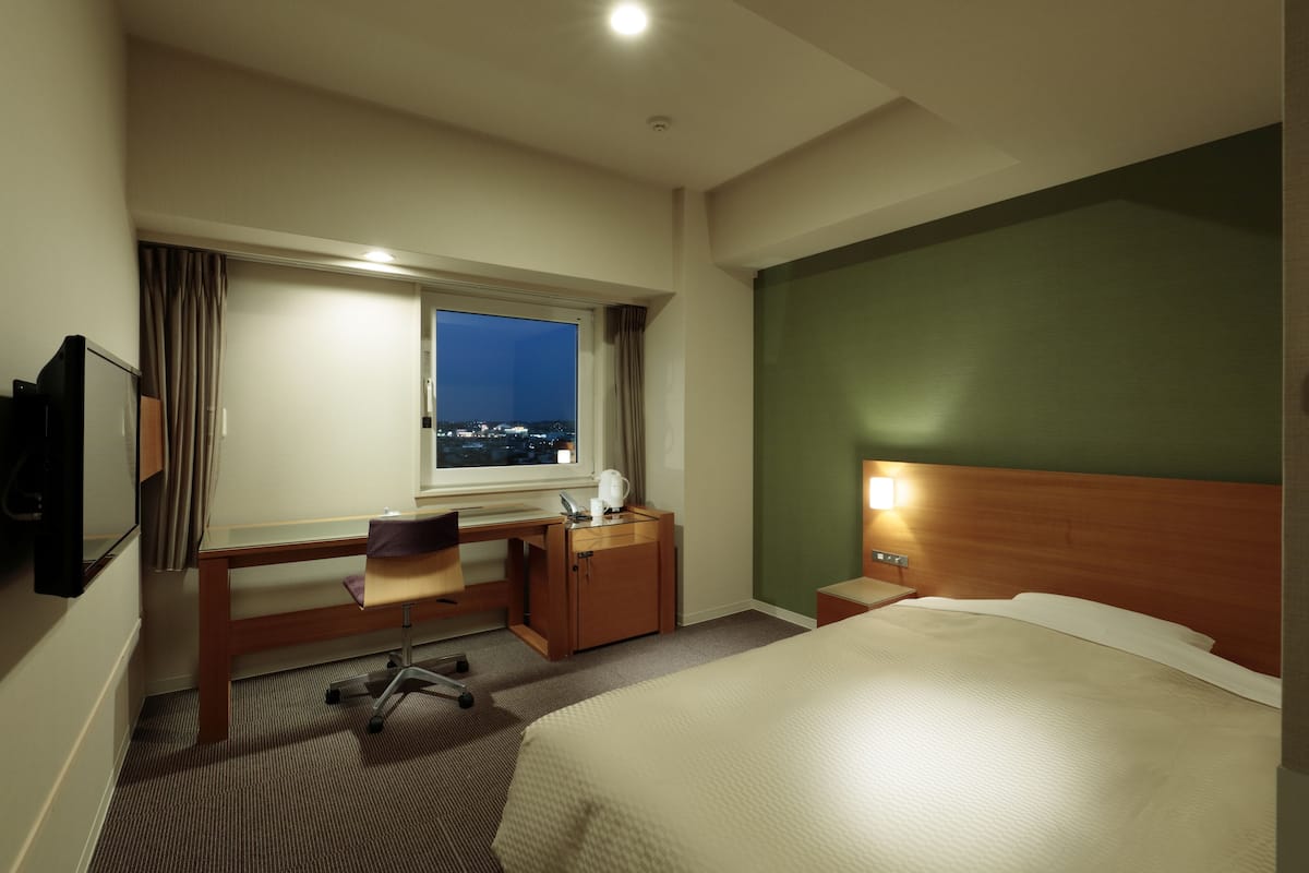 Premium bedding, blackout drapes, soundproofing, iron/ironing board
