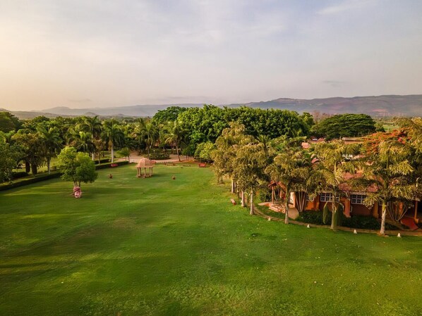 Enjoy a serene round of golf amidst lush green fairways and scenic views.