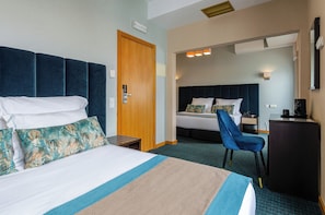 Family Room (4 Adults) | Minibar, in-room safe, individually decorated, individually furnished