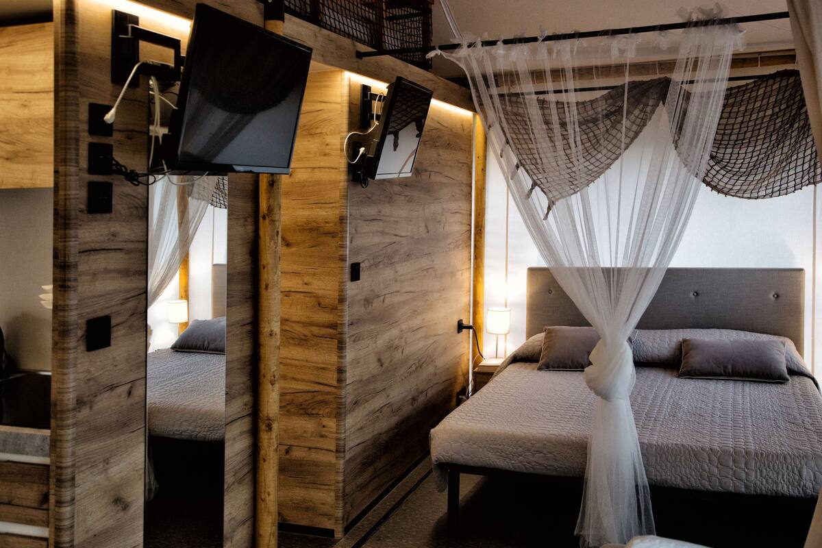 luxury tent, 3 bedrooms, lake view | 1 bedroom, in-room safe, individually furnished, desk