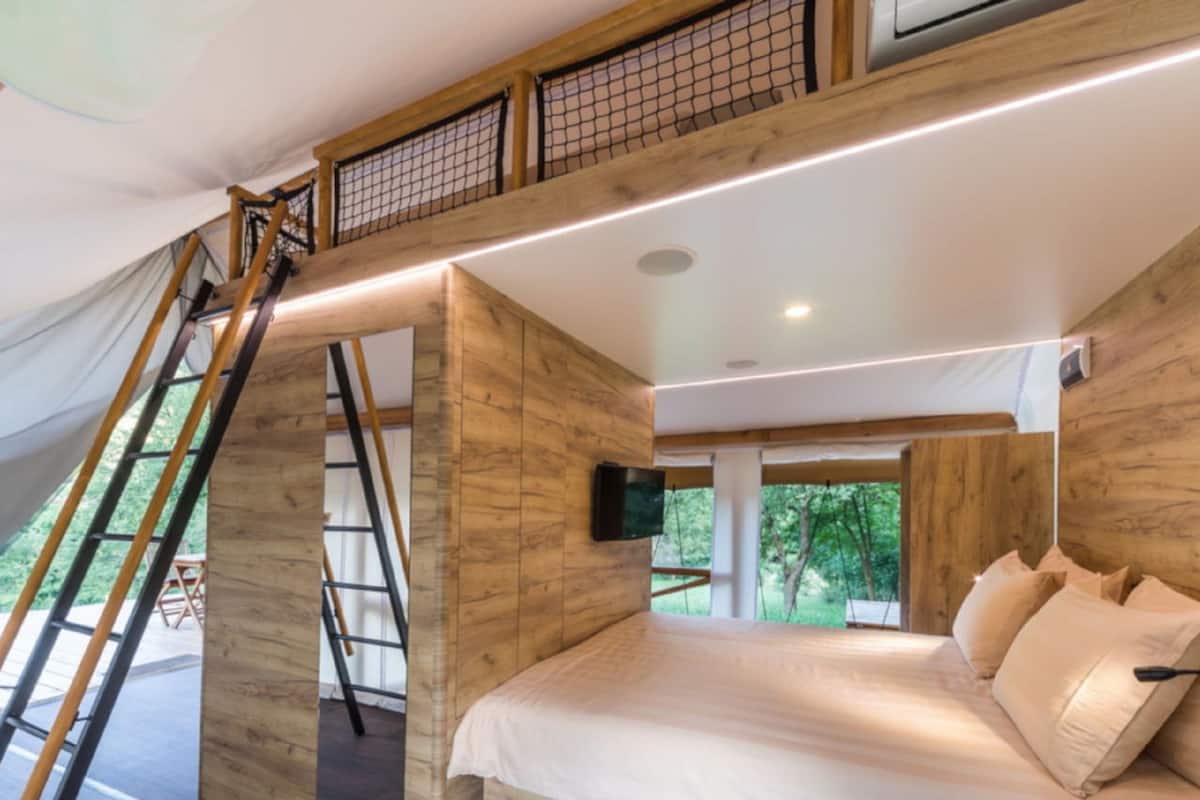 panoramic tent, 1 bedroom, private bathroom, lake view | 1 bedroom, in-room safe, individually furnished, desk