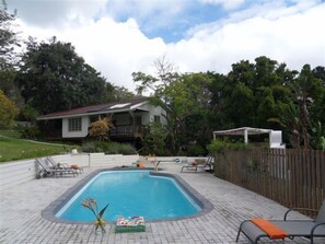 Outdoor pool, pool umbrellas, pool loungers