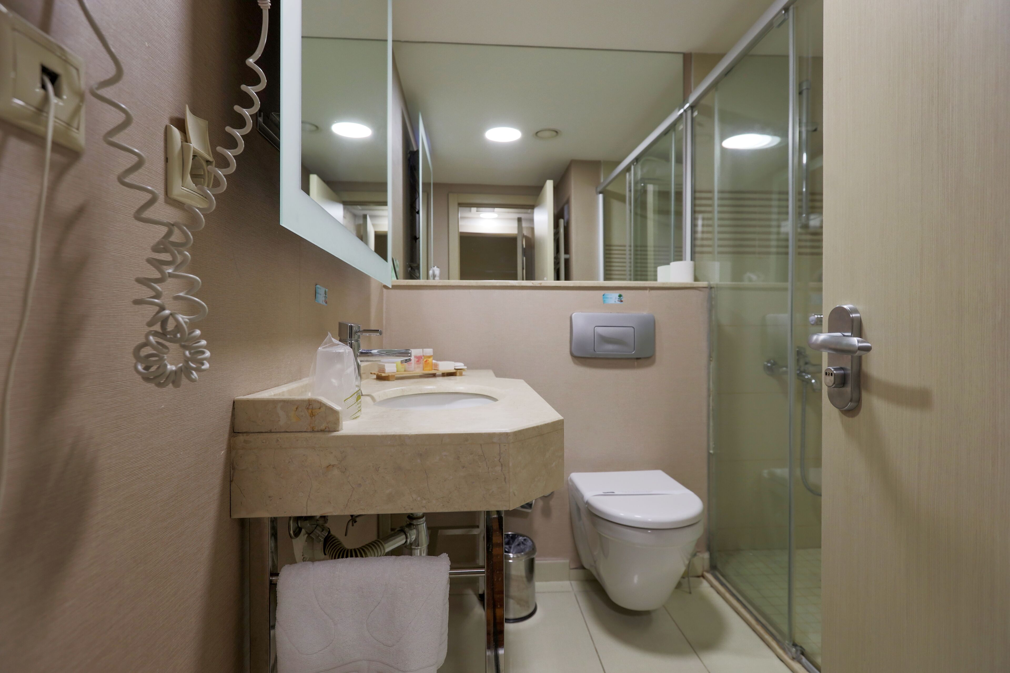 standard room | bathroom | shower, free toiletries, hair dryer, slippers