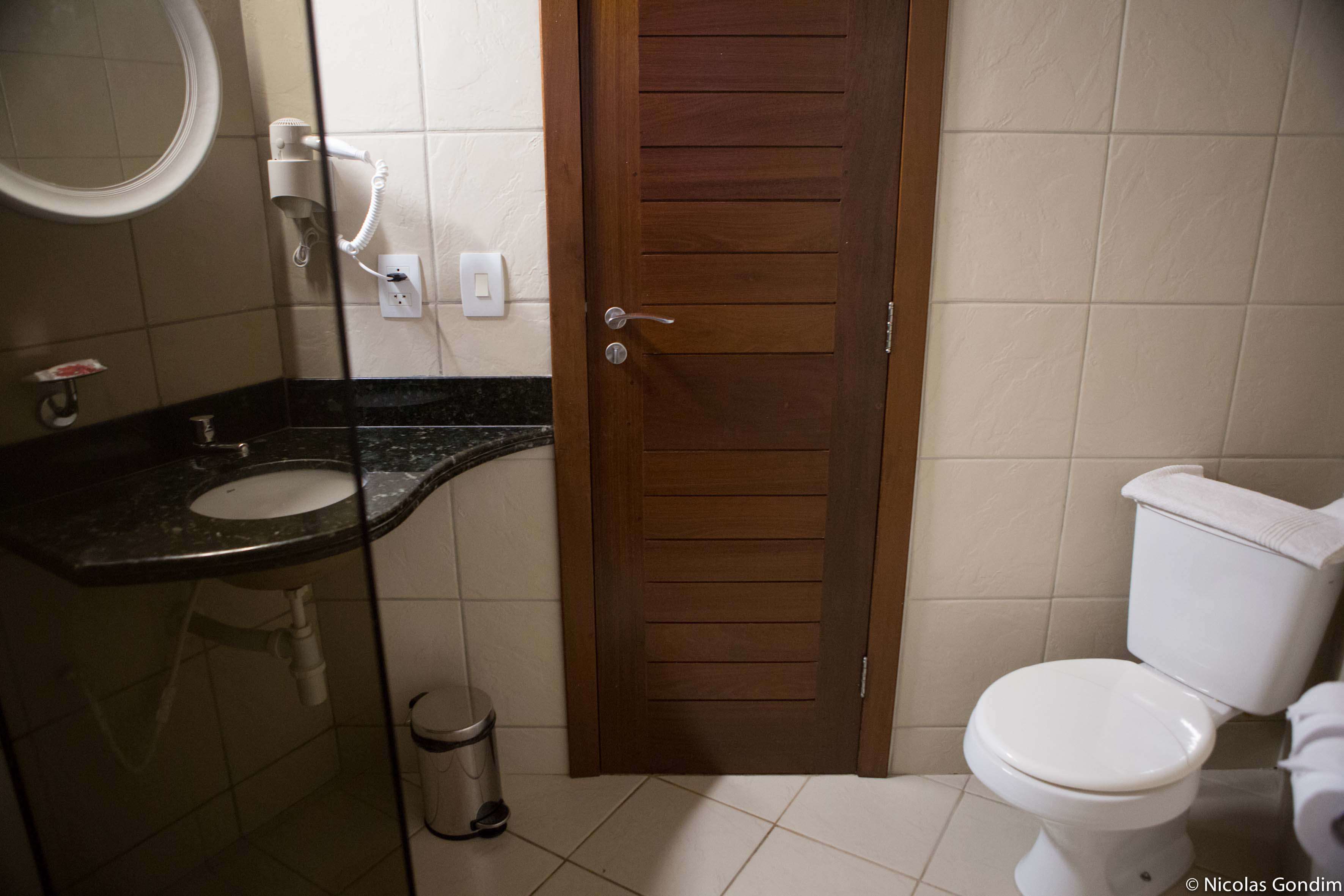 shower, rainfall showerhead, hair dryer, towels