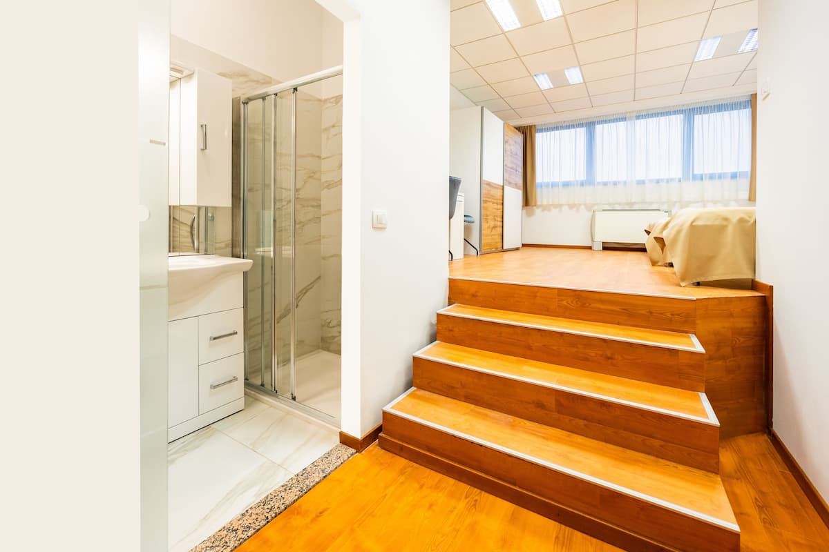Superior Triple Room | Minibar, desk, laptop workspace, blackout drapes