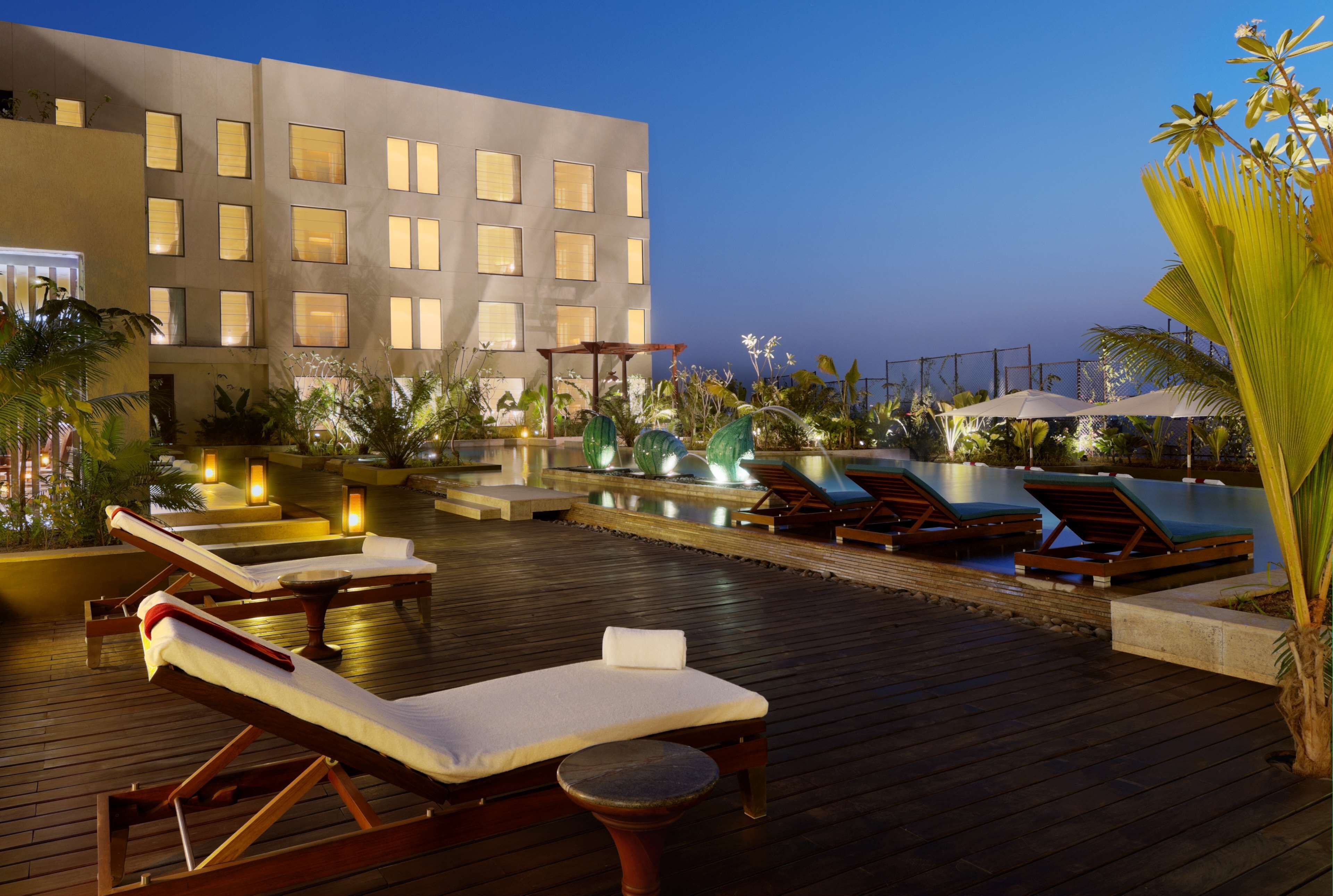 Outdoor pool, open 7:00 AM to 9:00 PM, free cabanas, pool umbrellas